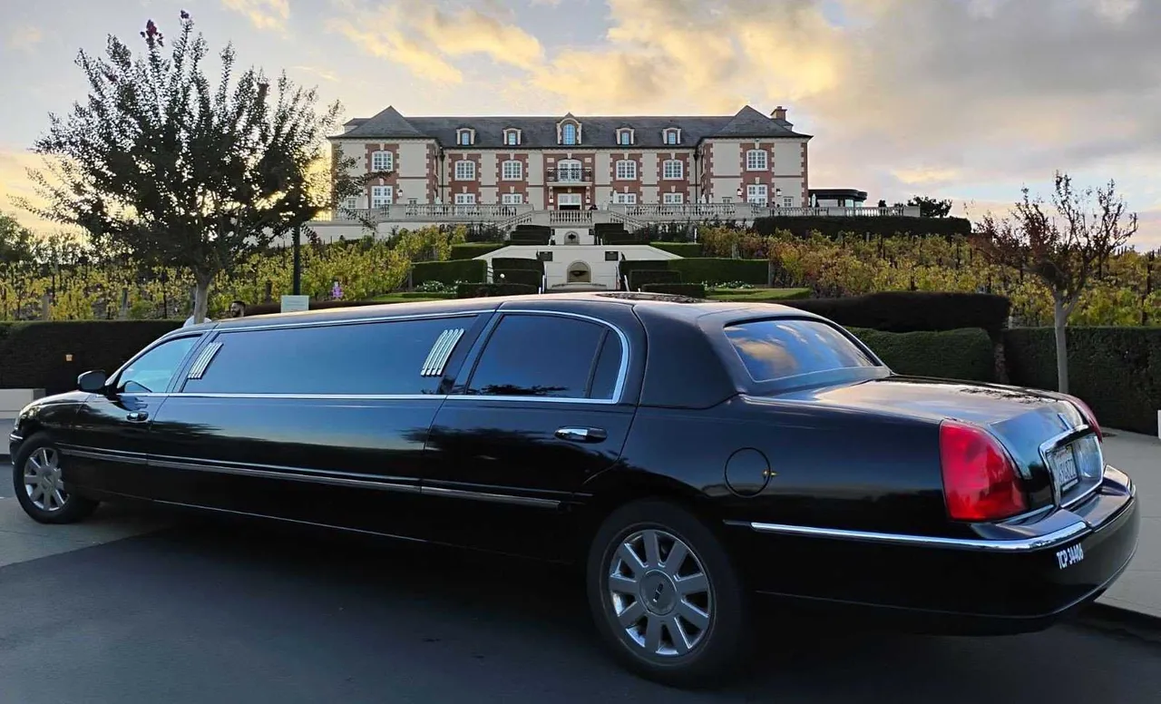 Black Lincoln Town Car Stretch Limousine with tinted windows for wedding car rental