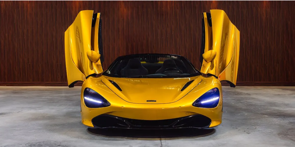 Yellow McLaren 720S exterior with convertible roof for wedding car rental in Morris County, NJ