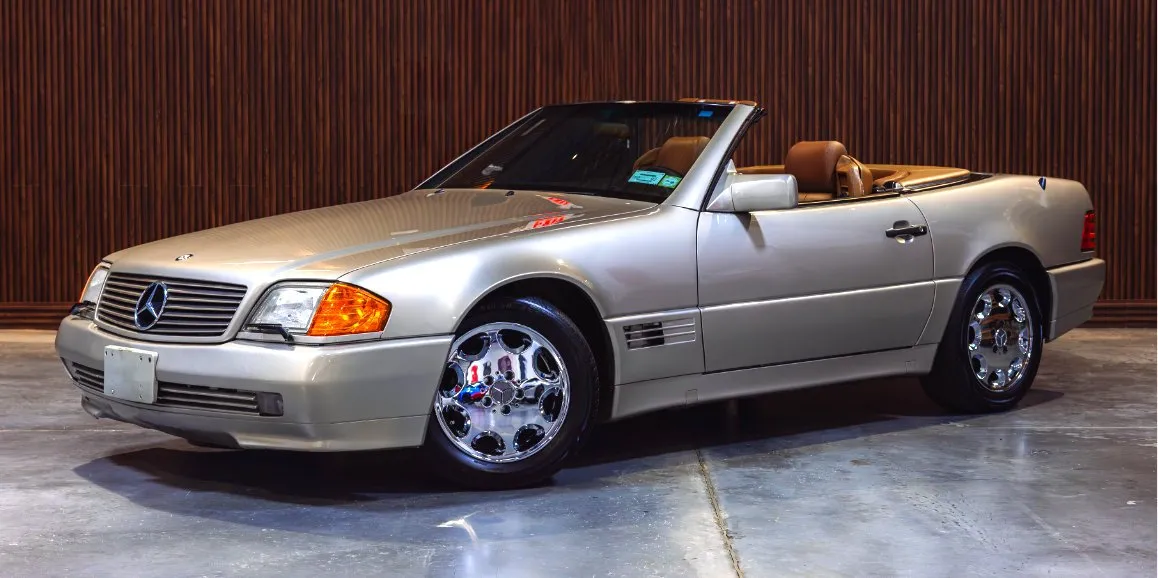 Silver Mercedes-Benz SL500 with convertible roof for wedding car rental in Toms River, NJ