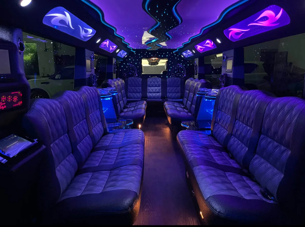 Mercedes-Benz G Wagon interior with perimeter lounge seating, LED accent lighting and LED ceiling lighting for wedding car rental