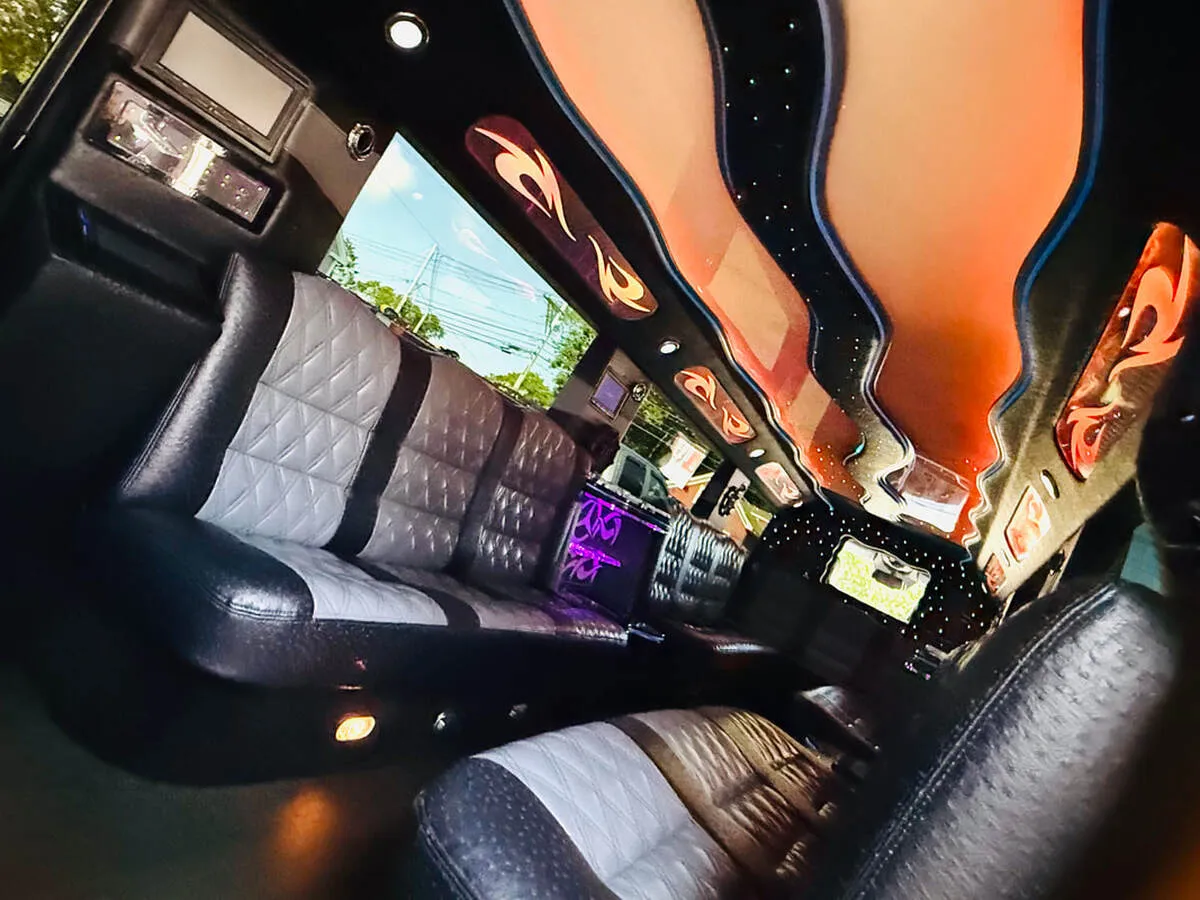 Mercedes-Benz G Wagon interior with perimeter lounge seating, LED ceiling lighting and starlight or fiber-optic ceiling for wedding car rental