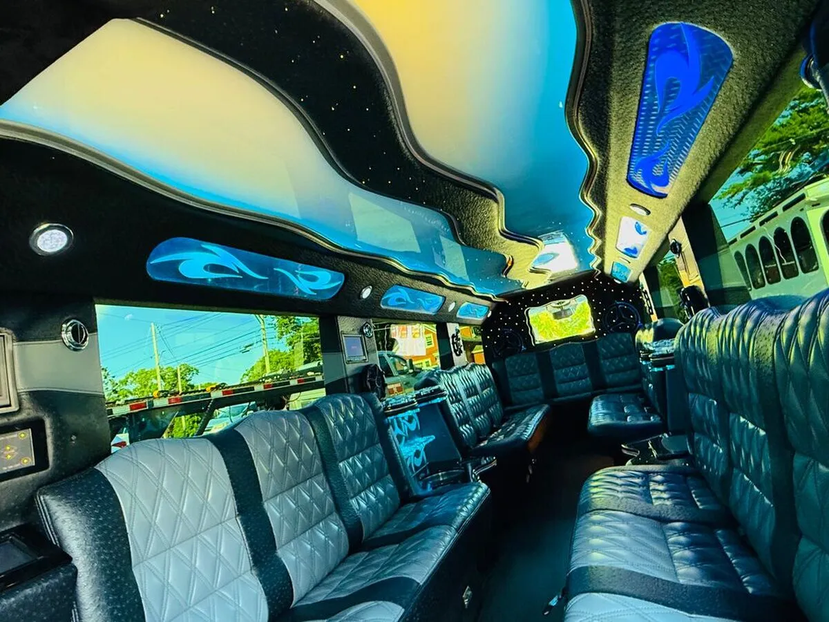 Mercedes-Benz G Wagon interior with perimeter lounge seating, LED ceiling lighting and starlight or fiber-optic ceiling, photo 9 for wedding car rental