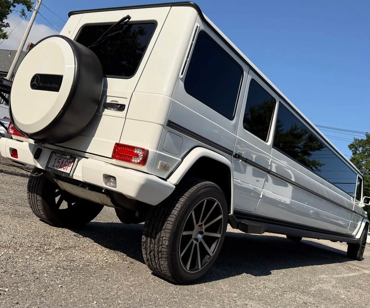 White Mercedes-Benz G Wagon exterior with tinted windows for wedding car rental