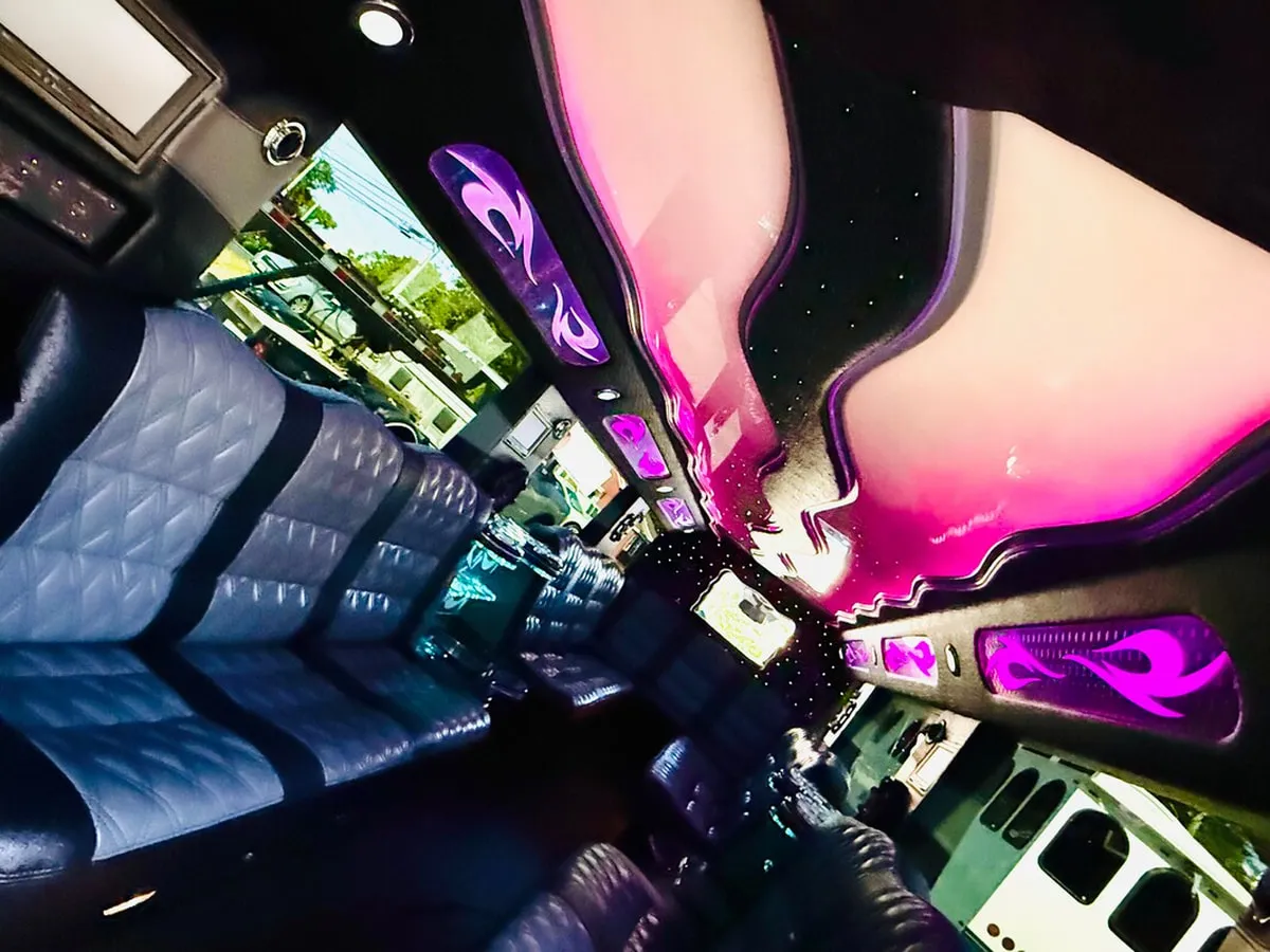 Mercedes-Benz G Wagon interior with perimeter lounge seating, LED ceiling lighting and starlight or fiber-optic ceiling, photo 10 for wedding car rental