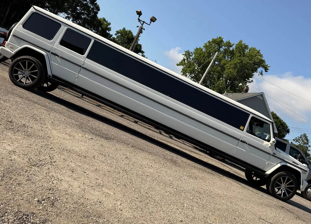 White Mercedes-Benz G Wagon exterior with tinted windows, photo 5 for wedding car rental