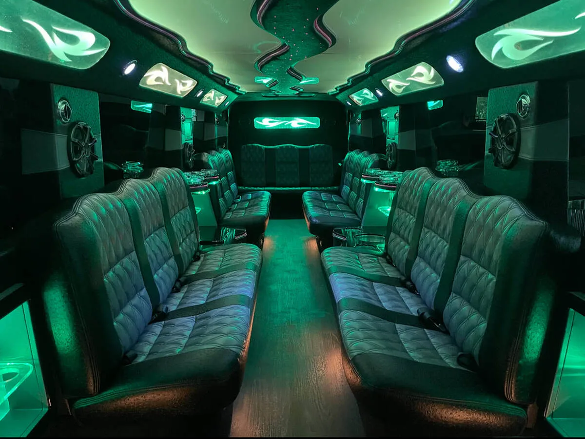Mercedes-Benz G Wagon interior with perimeter lounge seating, LED accent lighting and LED ceiling lighting, photo 11 for wedding car rental
