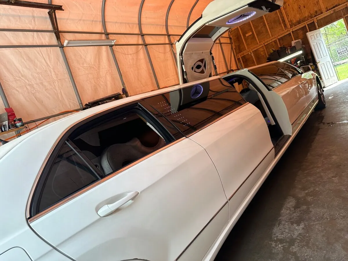 White Mercedes-Benz Jet Doors Limousine exterior with tinted windows and bridal (jet) door for wedding car rental in Capitol Planning Region, CT