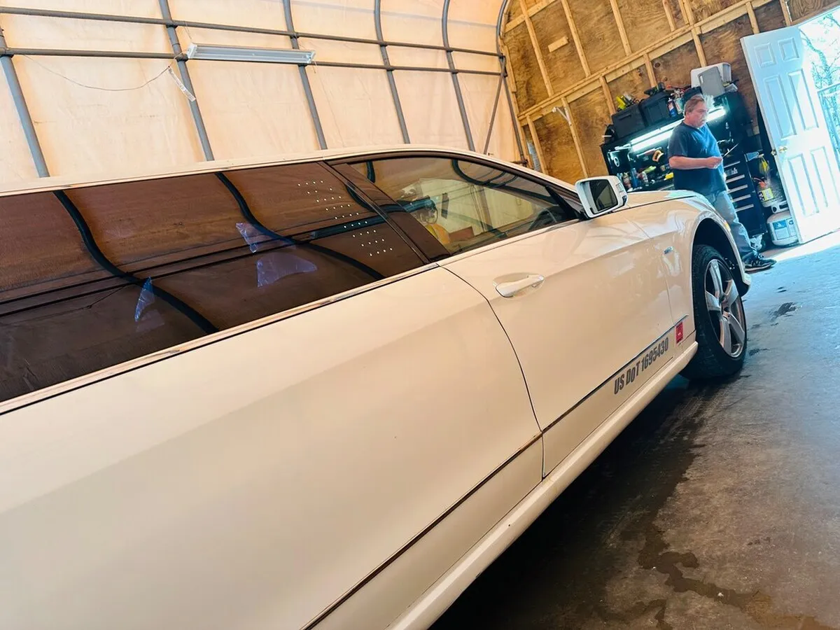 White Mercedes-Benz Jet Doors Limousine exterior with tinted windows, photo 6 for wedding car rental in Capitol Planning Region, CT