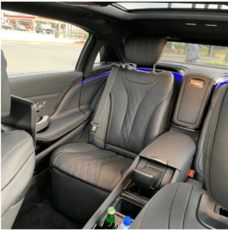 Mercedes Maybach interior with cup holders and LED accent lighting for wedding car rental