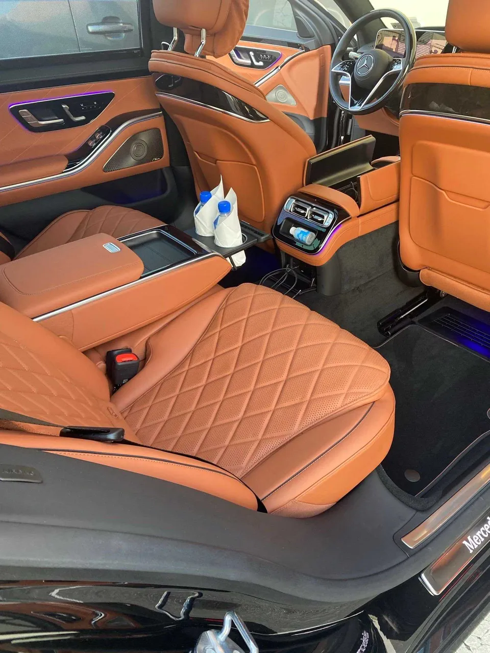 Mercedes-Benz S-Class interior with rear passenger controls and LED accent lighting for wedding car rental in North Canton, CT