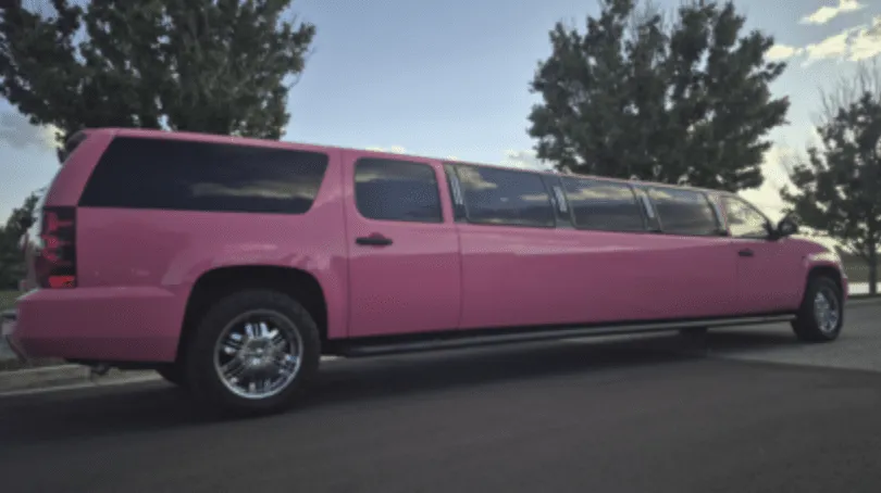 Chevrolet Suburban Limousine Pink Chevrolet Suburban Limousine with tinted windows for wedding car rental
