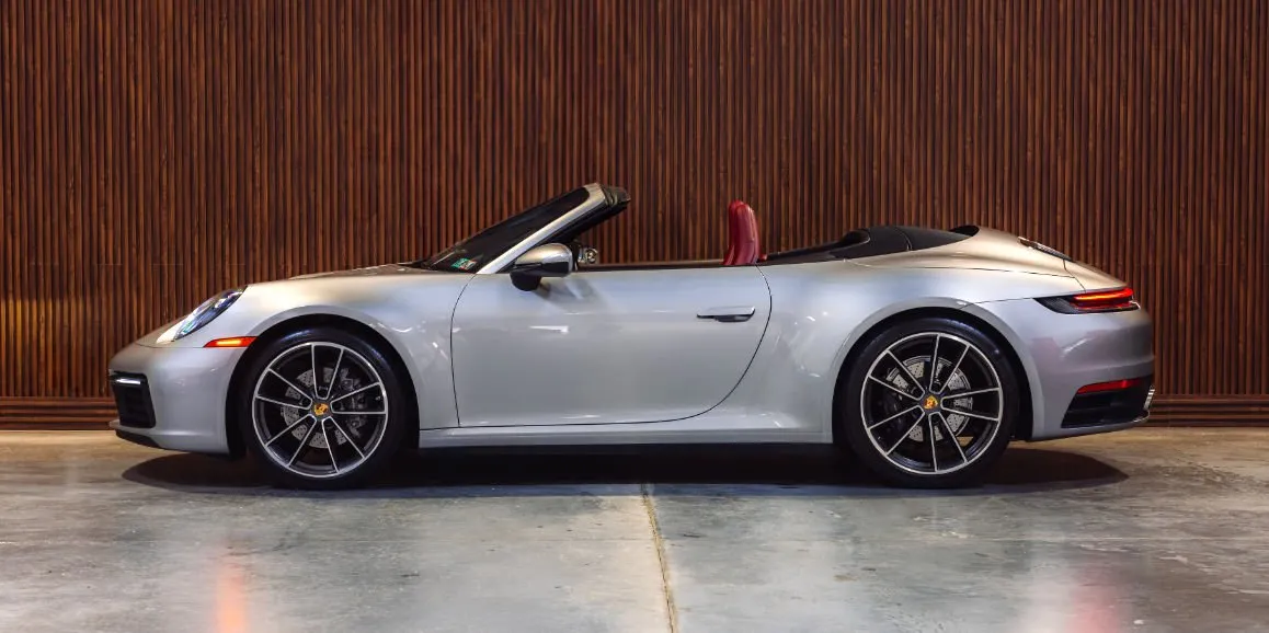Silver Porsche 911 exterior with convertible roof for wedding car rental in Toms River, NJ