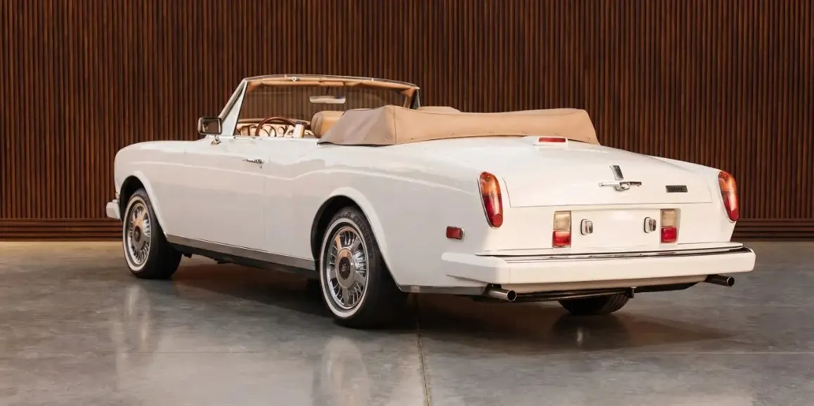 White Rolls-Royce Corniche 1975 exterior with convertible roof, photo 3 for wedding car rental in Toms River, NJ
