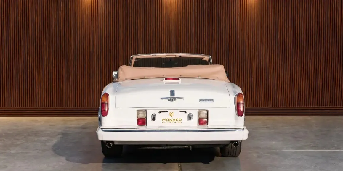 White Rolls-Royce Corniche 1975 exterior with convertible roof, photo 4 for wedding car rental in Toms River, NJ
