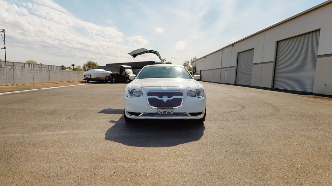White Chrysler 300 Stretch Limousine White Chrysler 300 Stretch Limousine for wedding car rental