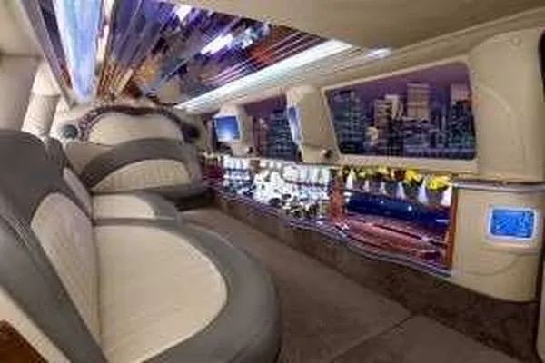 White Ford Excursion Limousine, bookable now